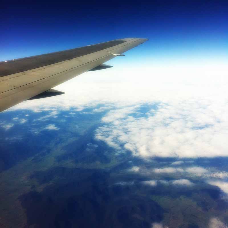 Airplane wing in flight.