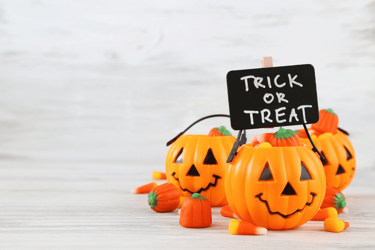 Plastic jack-o-lanterns filled with Halloween candy