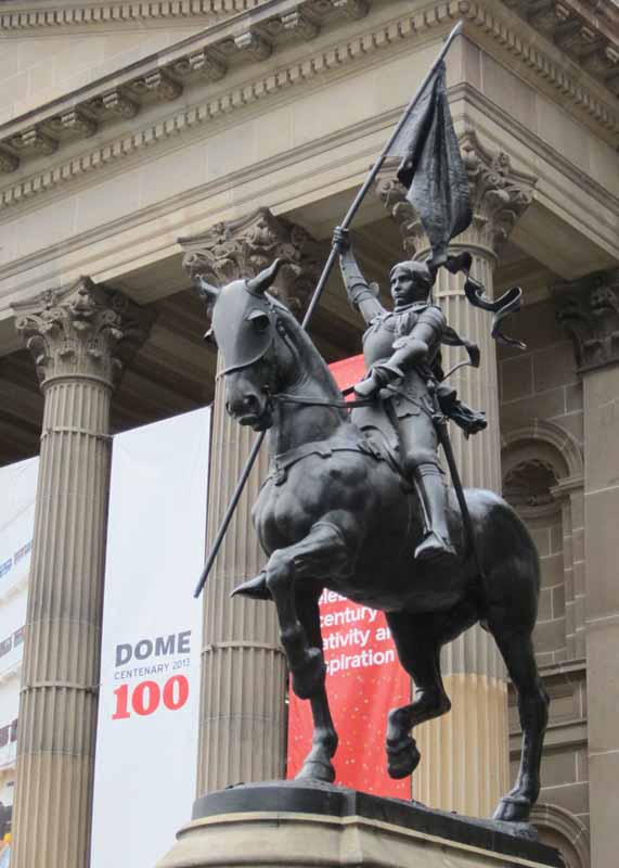A statue outside the State Library of Victoria.