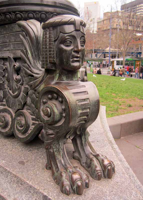 A statue outside the State Library of Victoria.
