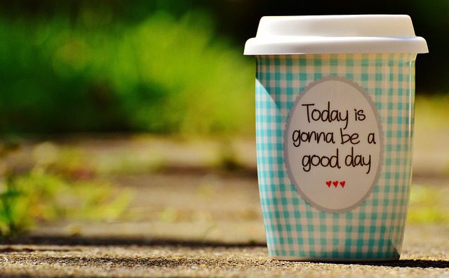 A coffee cup that says, "Today is gonna be a good day."