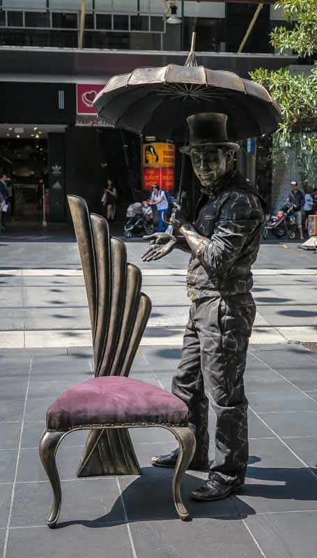 Man as statue.
