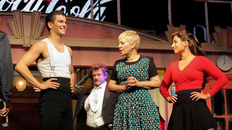 Catherine Martin on stage with Thomas Lacey (Scott) and Pheobe Panaretos (Fran).