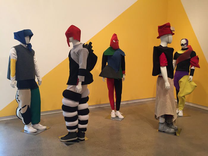 Mannequins wearing modernist designs.