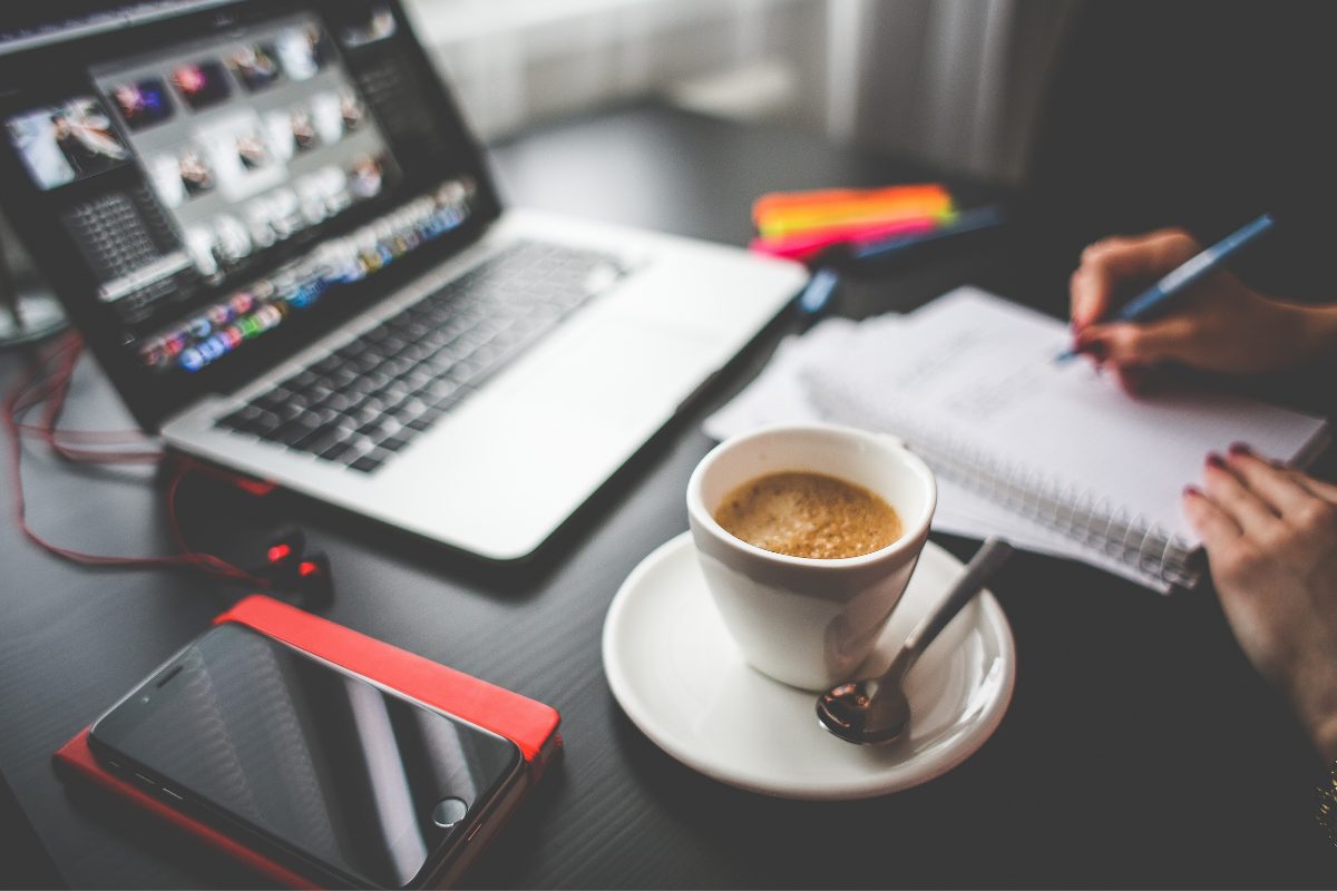 Working while drinking coffee.