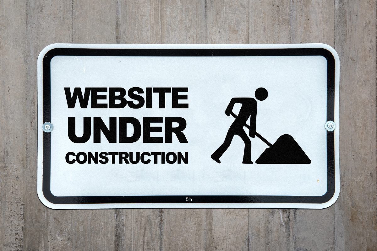 A sign that says, "website under construction".
