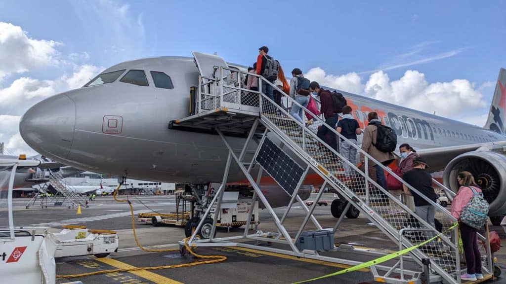 Passengers boarding a Jetstar plane.