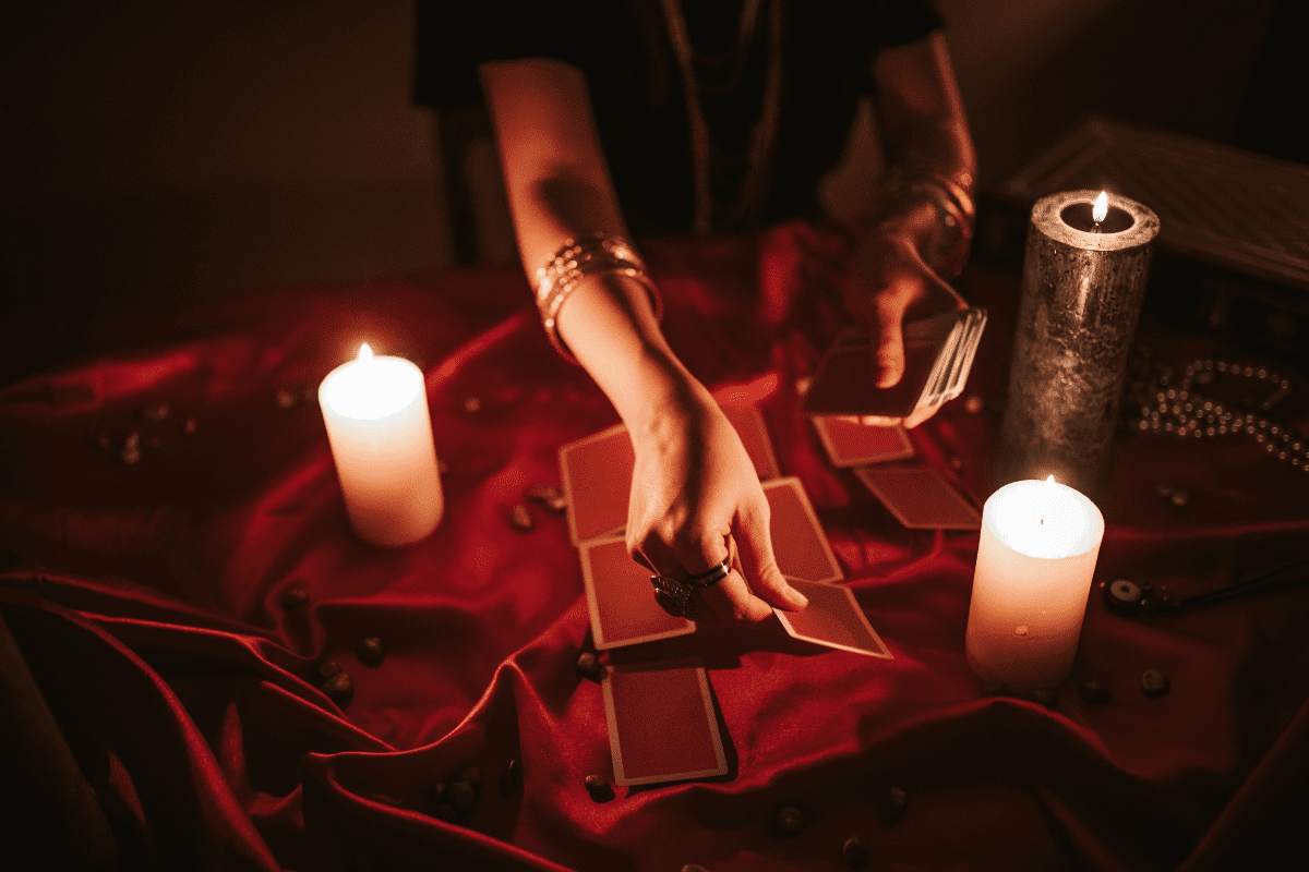 Woman spreading tarot cards