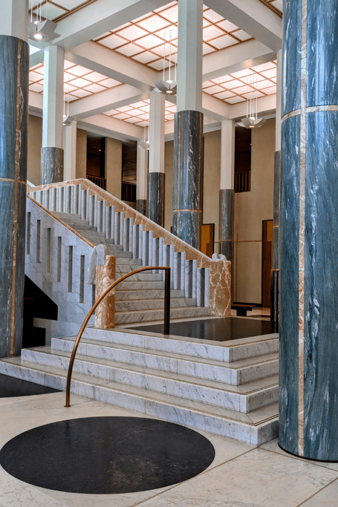 A staircase in the Marble Entrance Foyer of Parliament House.