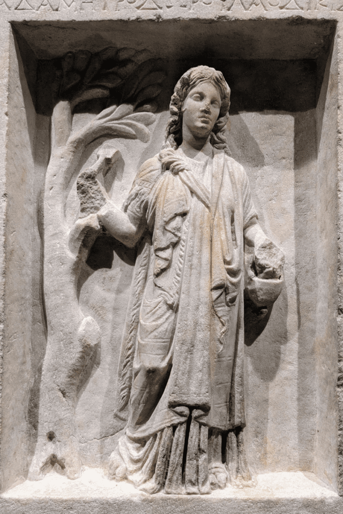 A Roman gravestone depicting a priestess of Isis.