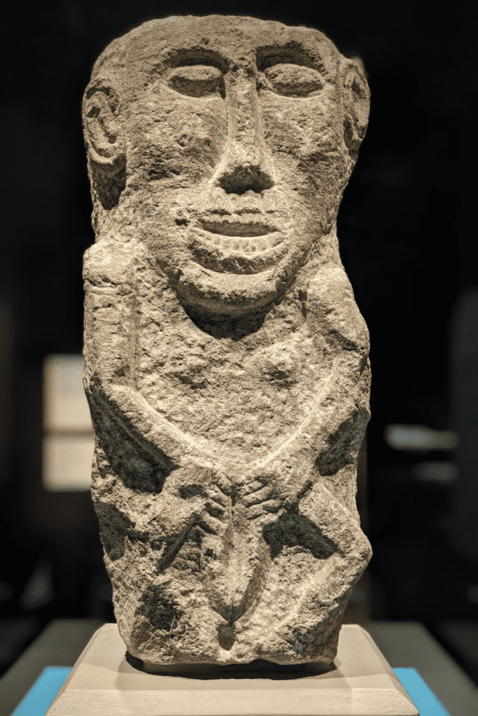 Stone carved figure of Sheela-na-gig, Ireland, 1100-1200 CE.