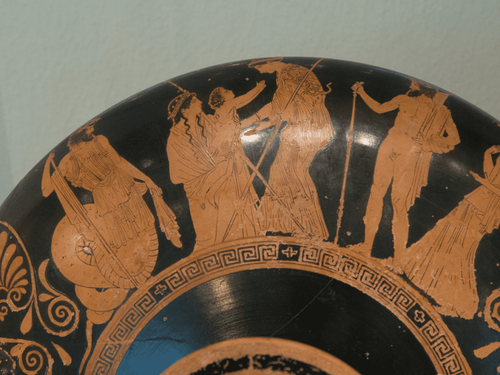 An Attic red cup depicting Athena receivomg Erichthonios from Ge, the Earth.