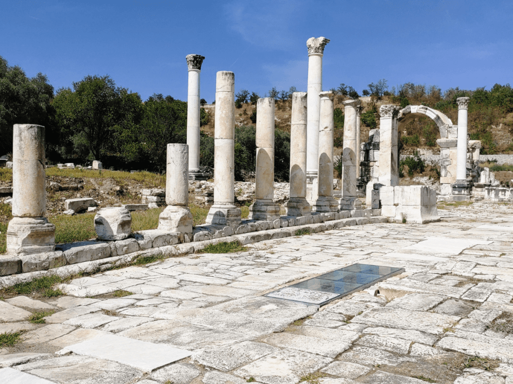 Ancient columns lining a road.