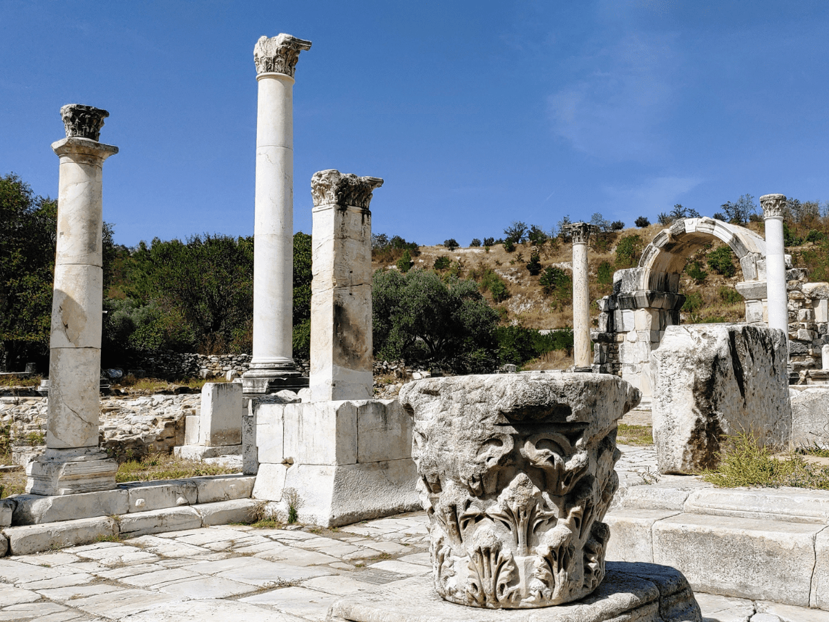 Ancient columns lining a road.