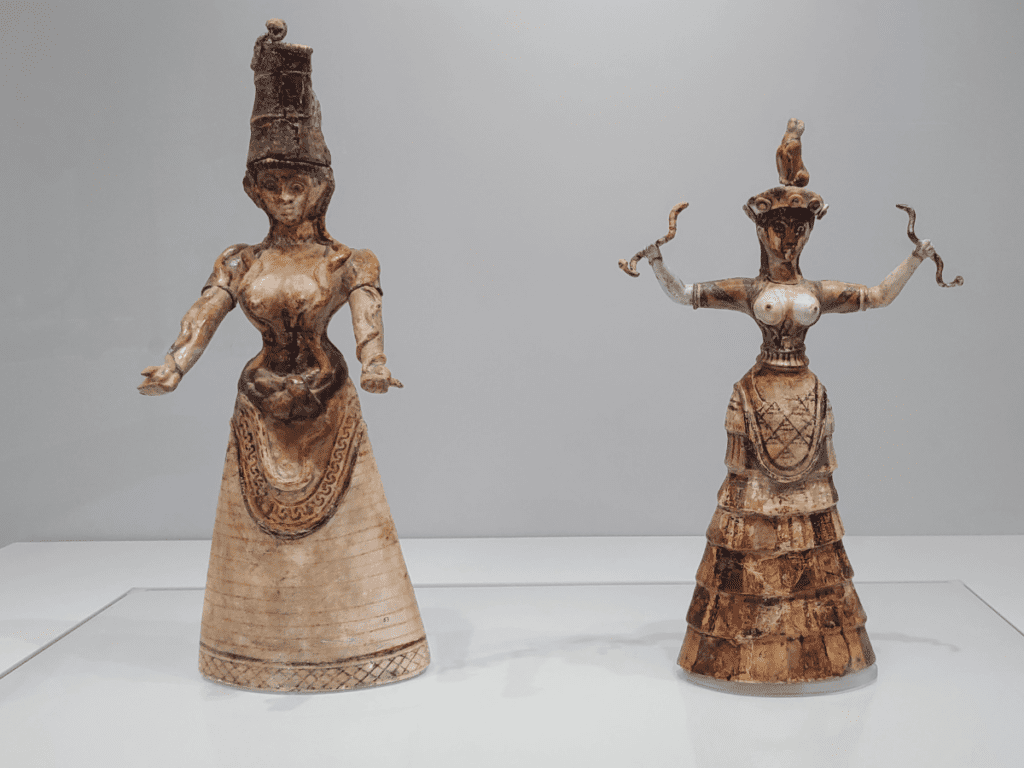 Minoan Snake Goddess figurines at the Heraklion Archaeological Museum.