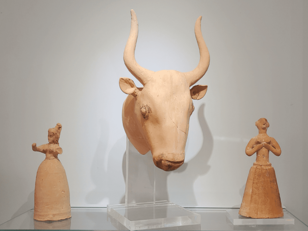 Bull head and female figurines.