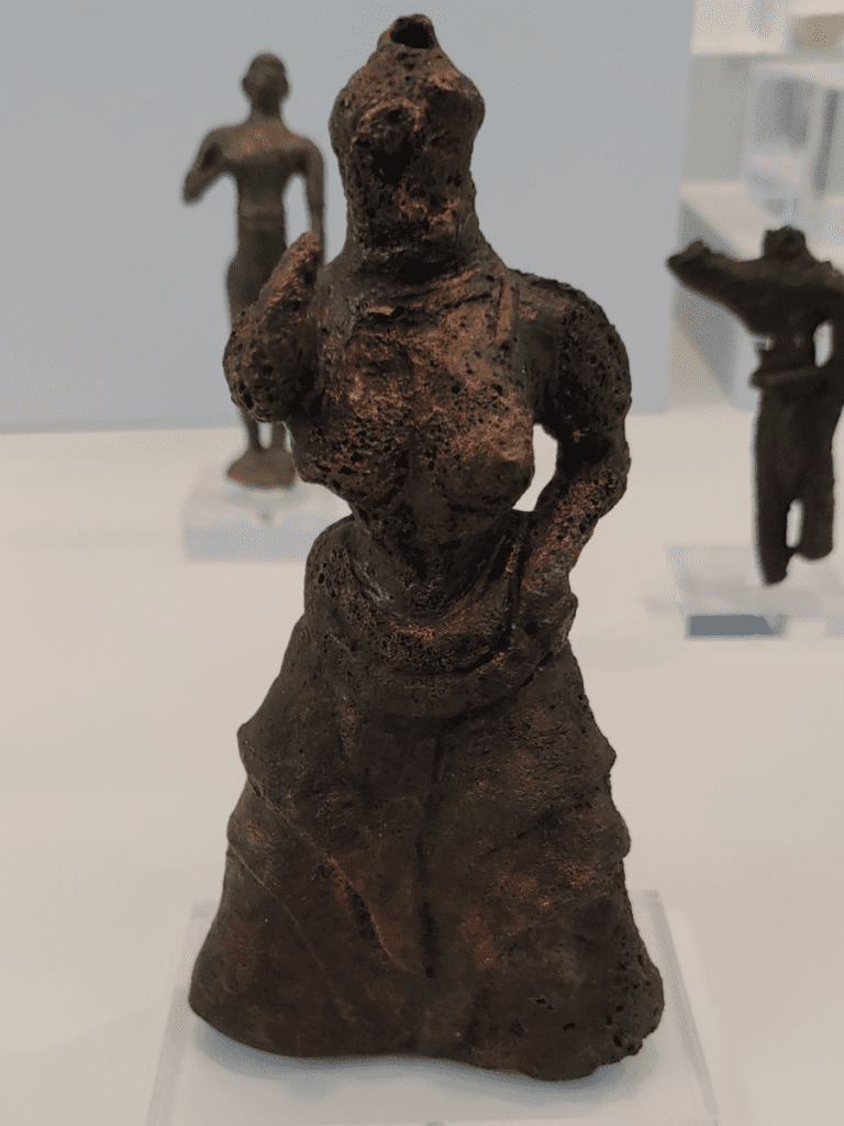 Bronze female figurine.