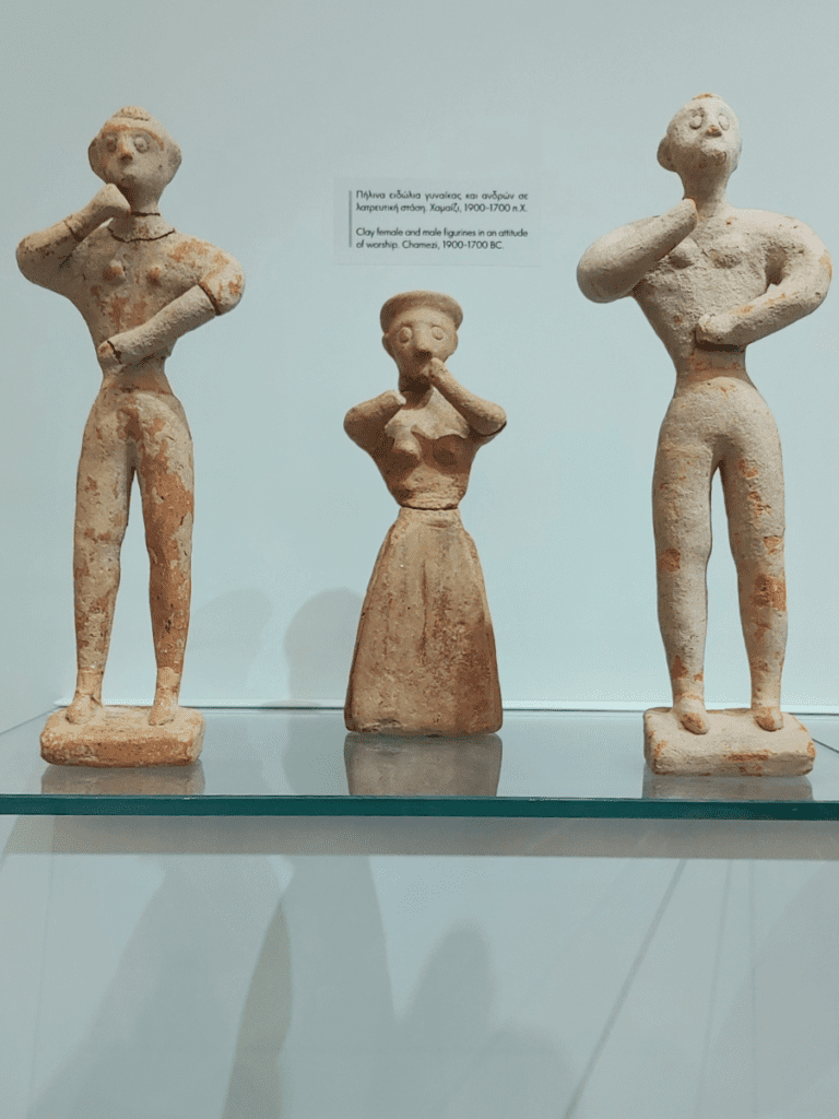 Clay male and female figurines.