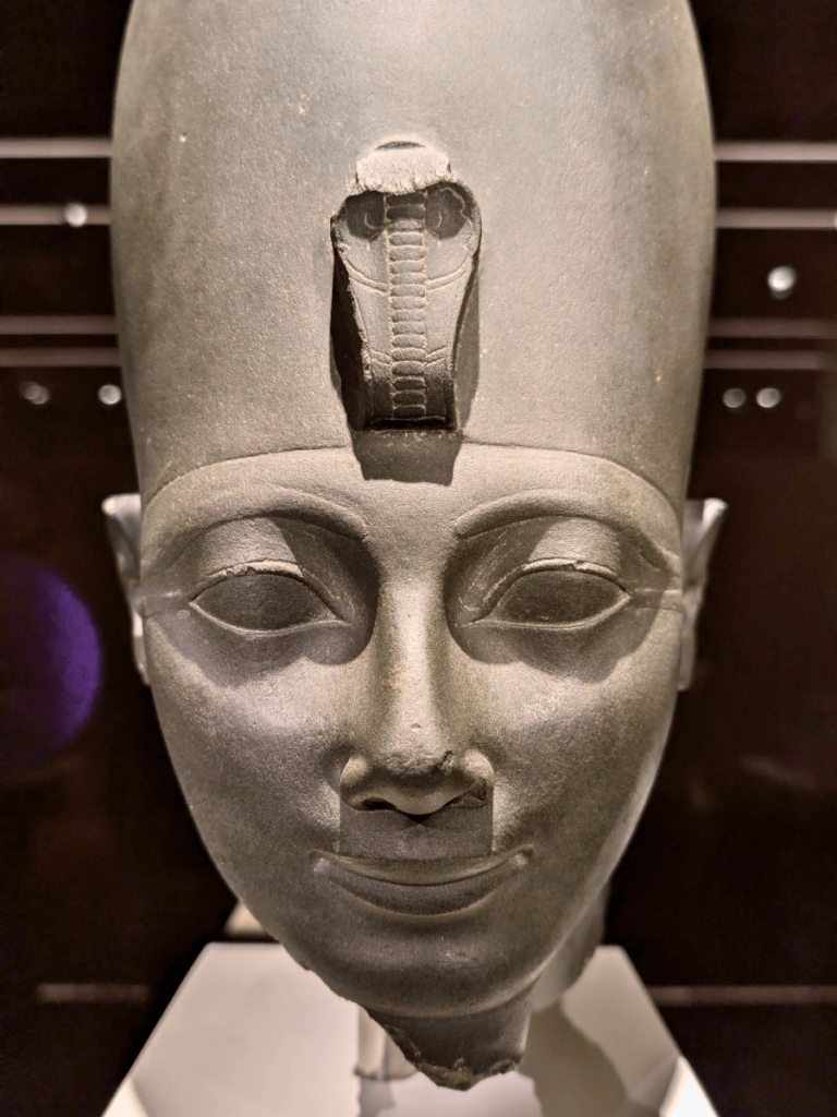 Green siltstone head from a fragmentary statue of Thutmose III.