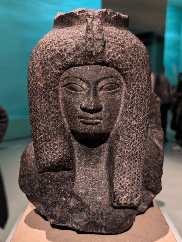 Fragmentary black granite statue of Queen Nefertari, Ramses II' first Great Wife.