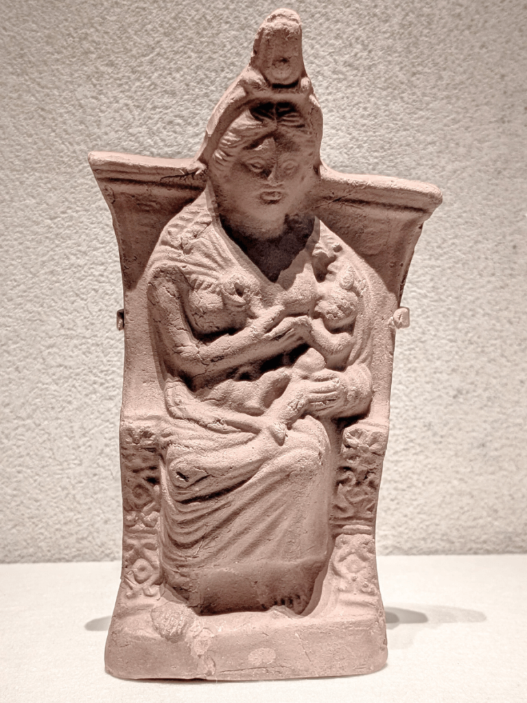Figure of the goddess Isis nursing Horus from the Roman Period.