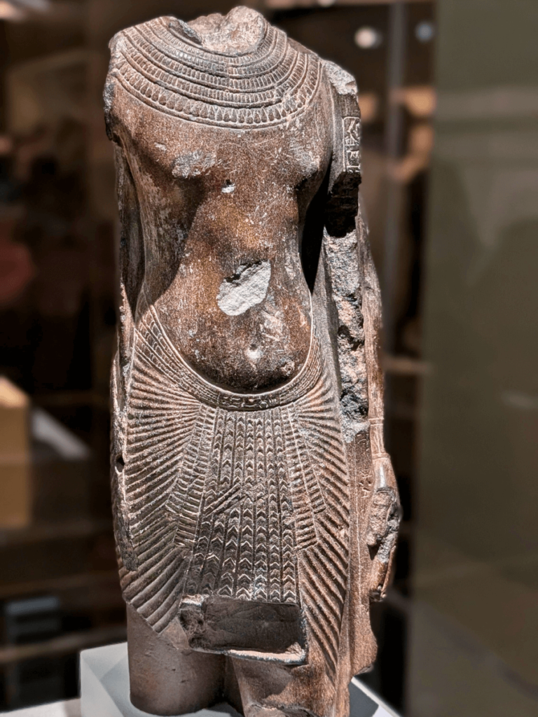 Fragmentary statue of Tutankhamun usurped by the later ruler Horemheb.