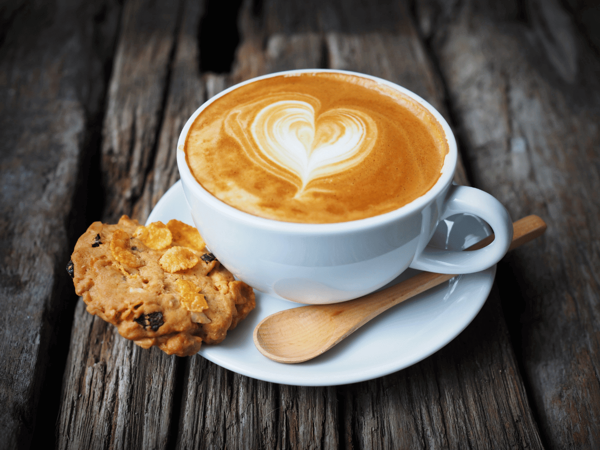 A cup of coffee and biscuit