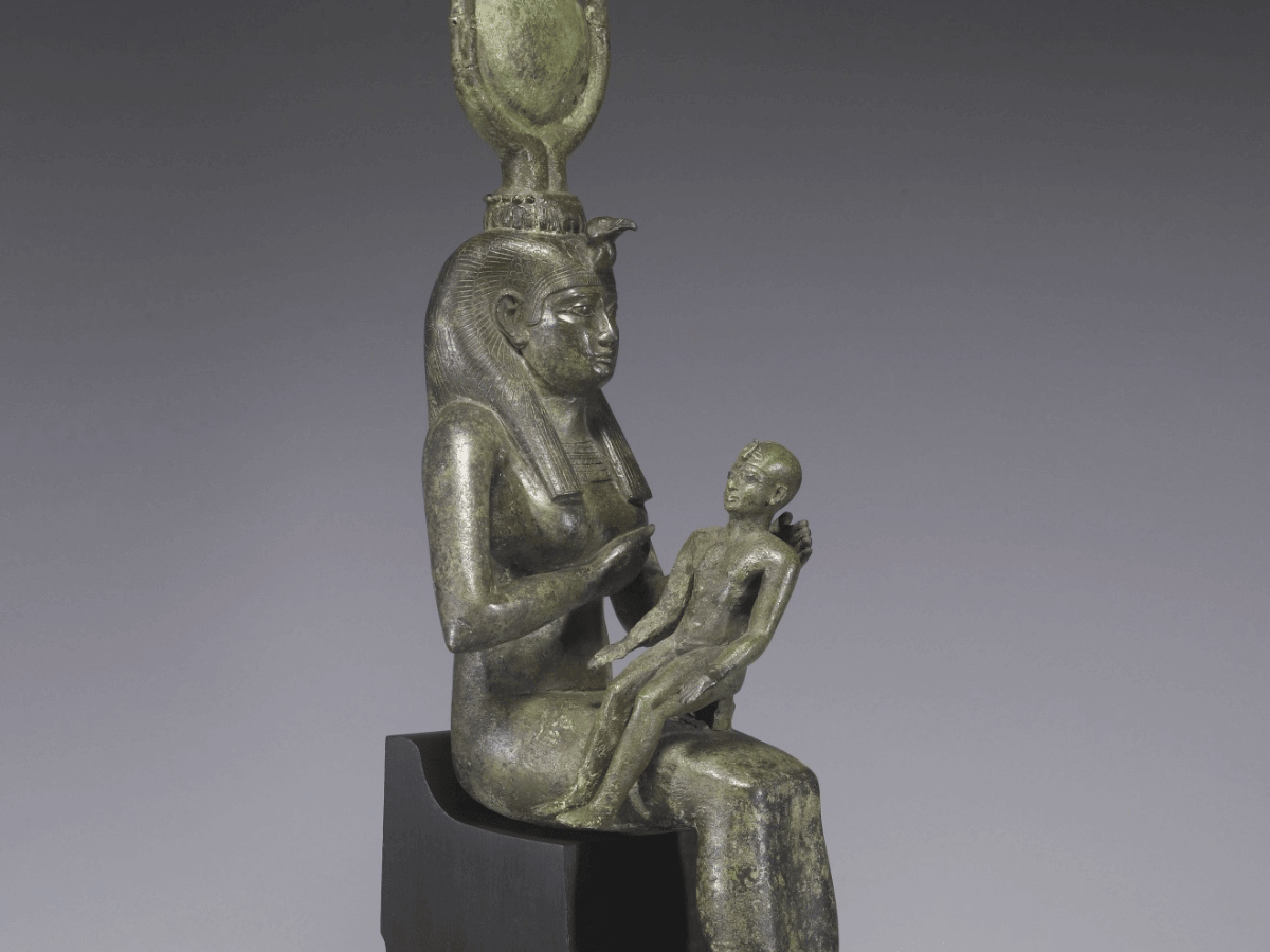 A statue of the ancient Egyptian goddess Isis nursing baby Horus.