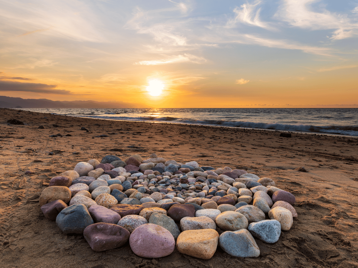 Stones arranged in circles on the beach