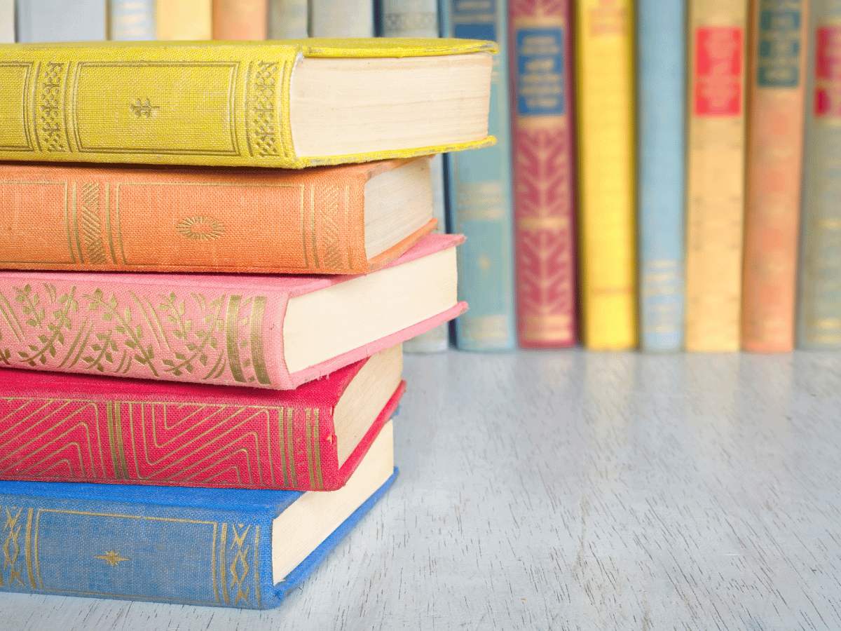 A stack of colourful books.