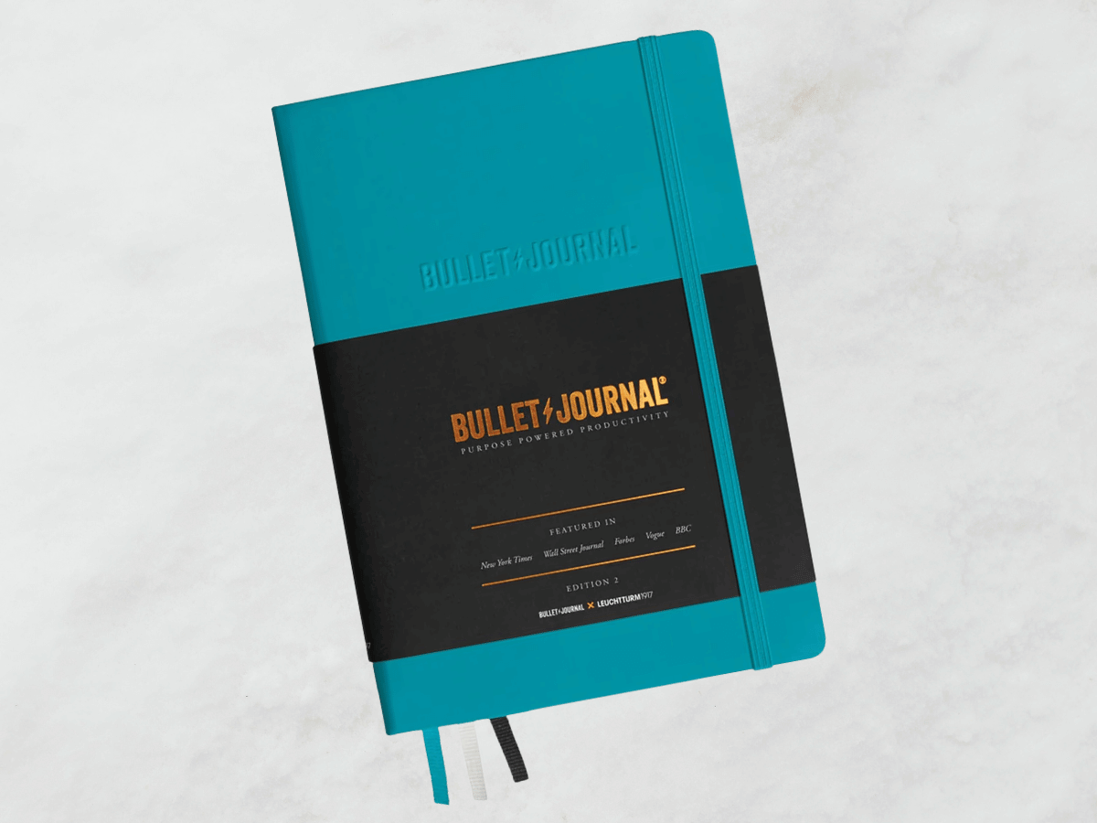 A turquoise Leuchtturm1917 Bullet Journal.