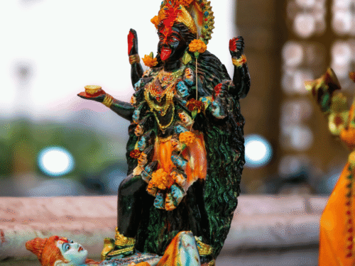 Statue of Kali standing on Shiva.