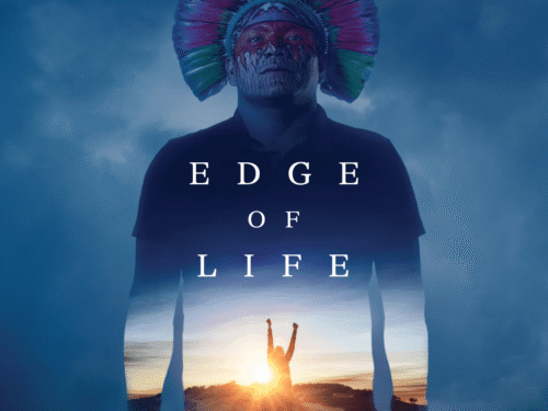 Poster for Edge of Life showing a person with painted face and feathered headdress, overlaid with a glowing silhouette raising arms at sunrise.