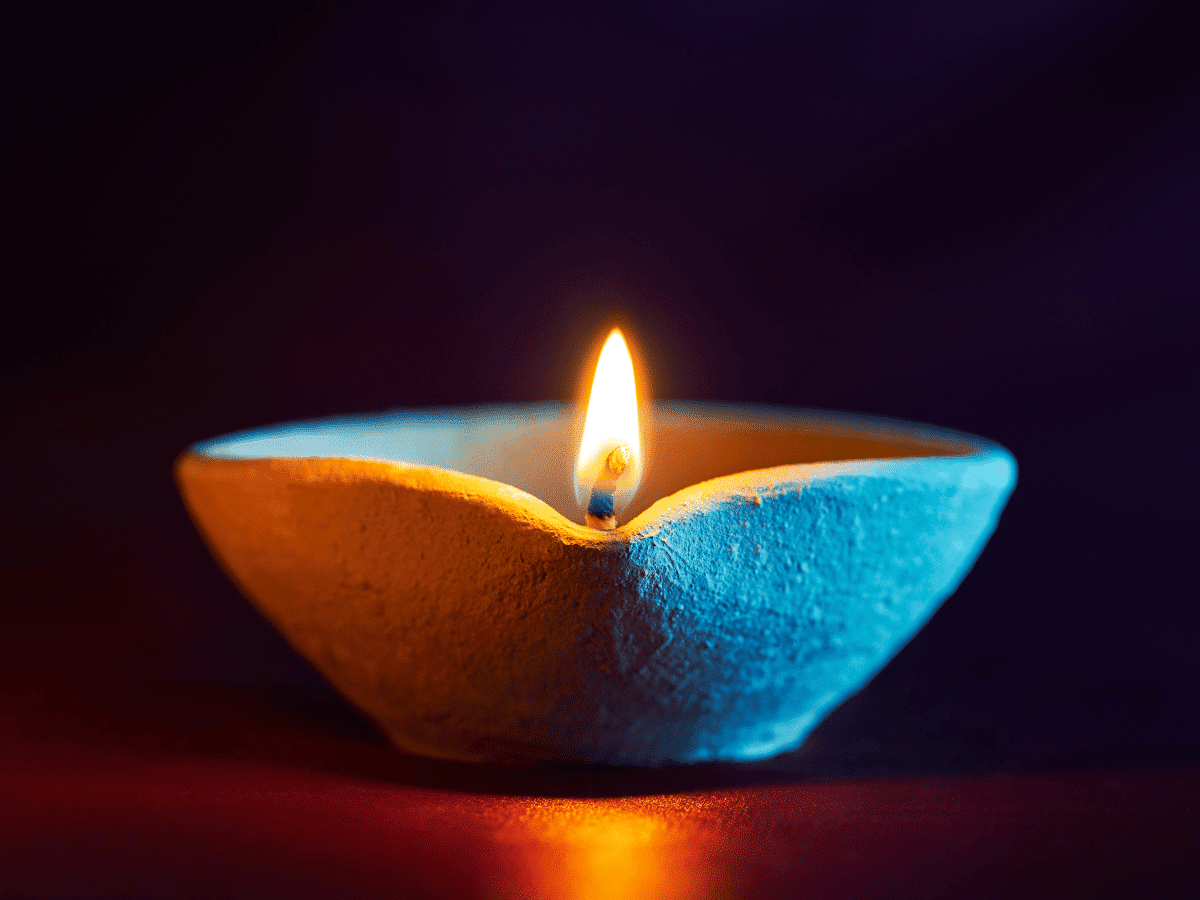 An oil lamp burning softly.