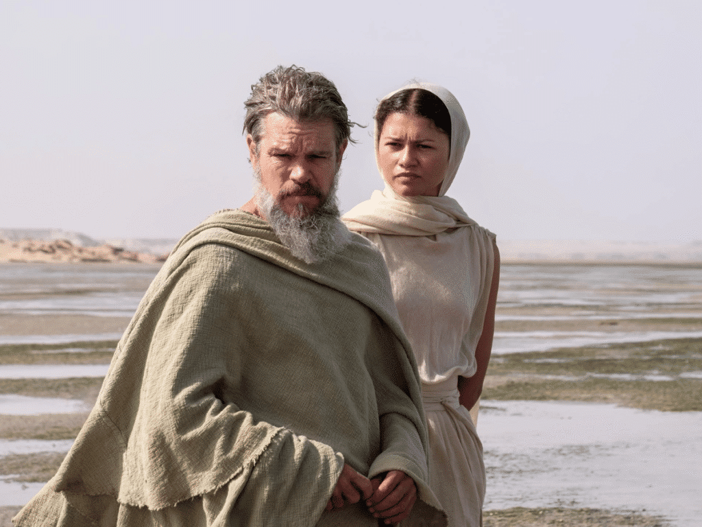 A man and a woman outside. A scene from The Odyssey.