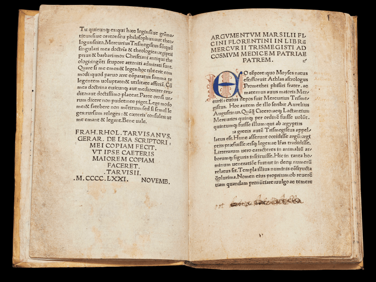A medieval-era book open showing a spread.